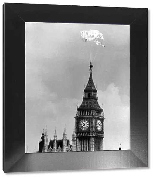 A parachutist heads for the Thames, passing Big Ben on the way