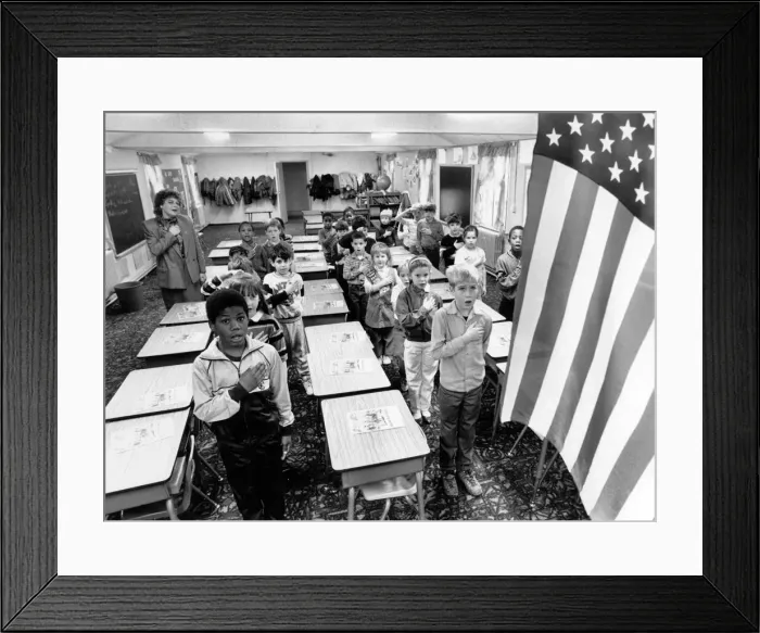 Framed Print : The frontier is ringed by a chain link fence topped with barbed wire Framed Print : The frontier is ringed by a chain link fence topped with barbed wire