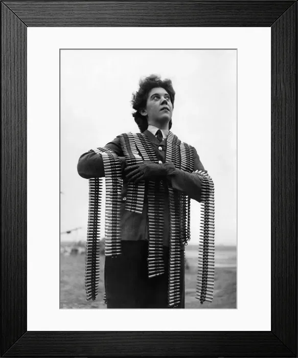 Framed Print : World War II Women: Annie get your gun. A WaF armourer loaded down with ammunition Framed Print : World War II Women: Annie get your gun. A WaF armourer loaded down with ammunition