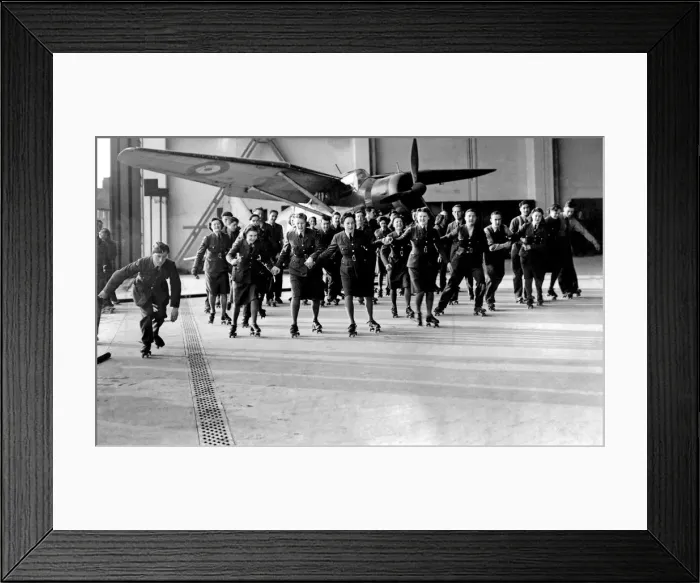 Framed Print : World War II Women. WaF and RAF ground crew seen here roller skating at their station a Framed Print : World War II Women. WaF and RAF ground crew seen here roller skating at their station a