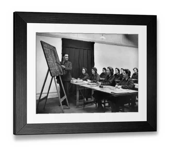 Framed Print : World War II Women. To free up men to fight at the front women are seen here attending