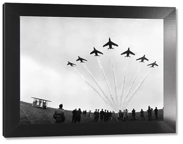 A Red Arrows display, Gnat trainers flying in formation over their base at Chivenor