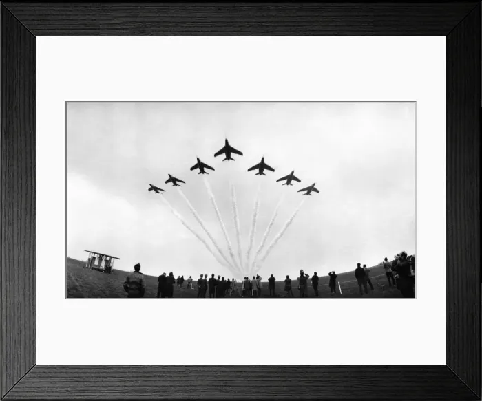 Framed Print : A Red Arrows display, Gnat trainers flying in formation over their base at Chivenor