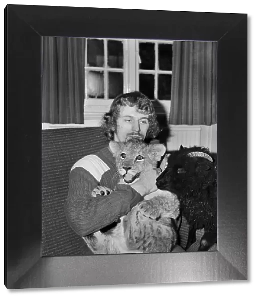 Lamb and Lion and Safari Warden Ken Lawrence. December 1974 74-7586-004