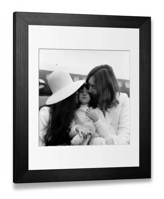 Framed Print : Beatle John Lennon and his wife Yoko Ono left Heathrow Airport London this afternoon (Sat