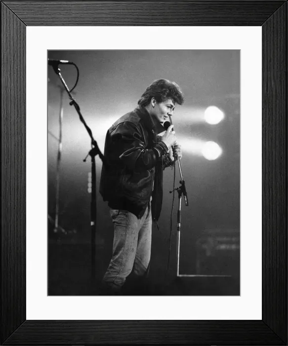 Framed Print : Morten Harket, lead singer of the Norwegian pop group A-ha, performing live on stage Framed Print : Morten Harket, lead singer of the Norwegian pop group A-ha, performing live on stage
