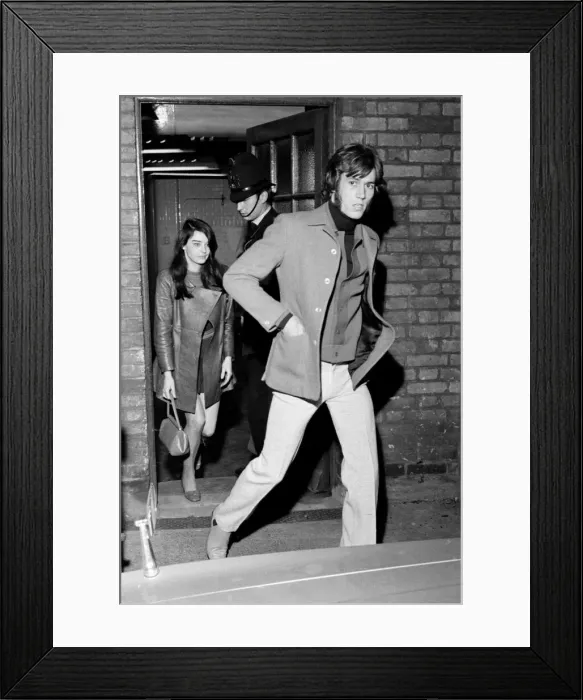 Framed Print : Pop star Barry Gibb, lead singer of the Bee Gees pop group pictured with his girlfriend Framed Print : Pop star Barry Gibb, lead singer of the Bee Gees pop group pictured with his girlfriend