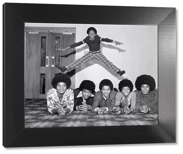 Members of the Jackson Five pop group become the Jackson Six when the latest addition to