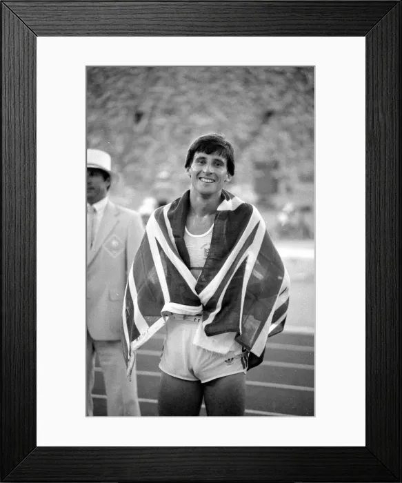 Framed Print : Sebastion Coe draped in a Union Jack at the 1984 Olympics in Los Angeles Framed Print : Sebastion Coe draped in a Union Jack at the 1984 Olympics in Los Angeles