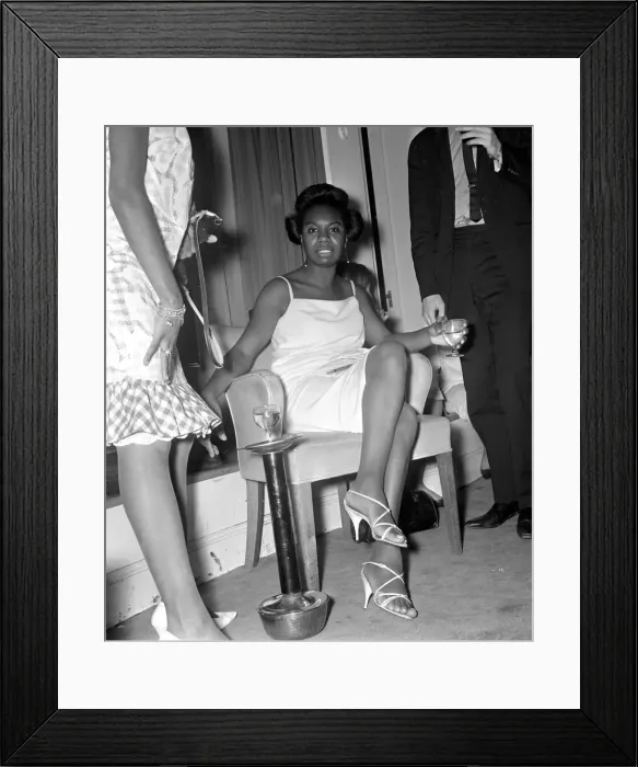 Framed Print : Singer Nina Simone relaxes at a press reception held at Philips record company building