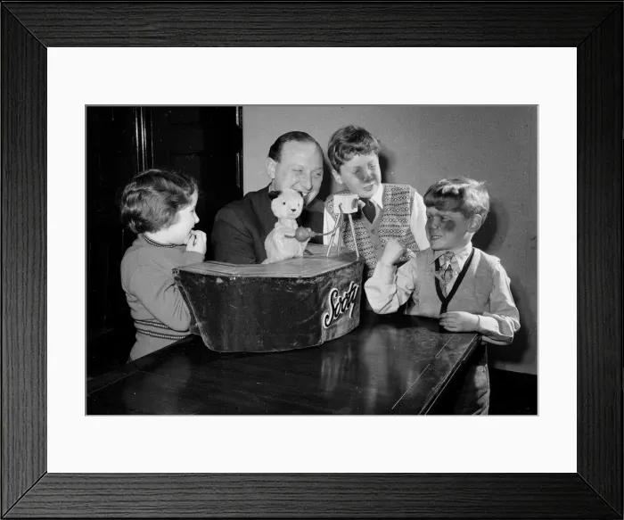 Framed Print : Harry Corbett and Sooty, the Teddy Bear Magician are seen here at home in Guisley Framed Print : Harry Corbett and Sooty, the Teddy Bear Magician are seen here at home in Guisley
