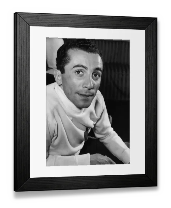 Framed Print : Al Martino at the Savoy Hotel, London wearing a heart sweater. June 1953