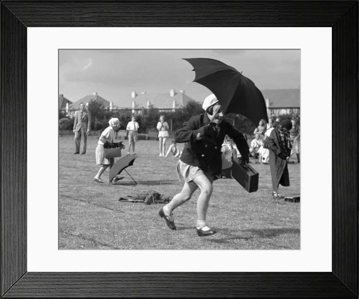 Framed Print : The umbrella race during a schools sports day in Kingston Upon Thames. Circa 1936 Framed Print : The umbrella race during a schools sports day in Kingston Upon Thames. Circa 1936