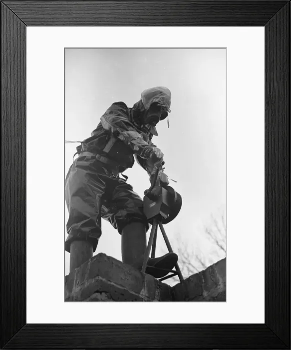 Framed Print : Preparations for war. ARP warden operates the air raid siren during a civil defence gas Framed Print : Preparations for war. ARP warden operates the air raid siren during a civil defence gas