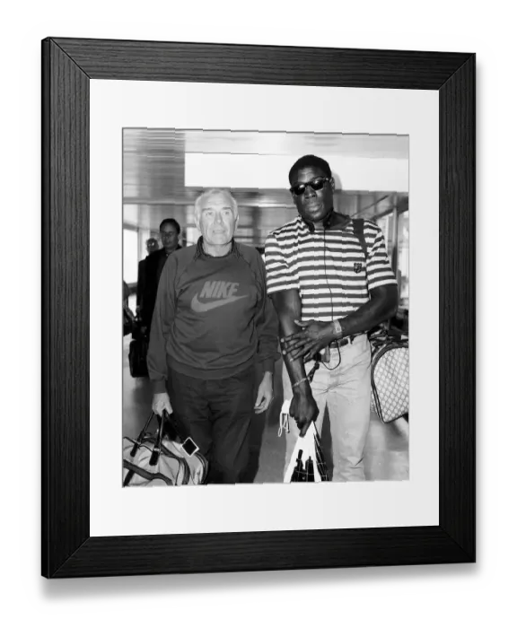 Framed Print : Frank Bruno Boxing arrives at Heathrow with manager