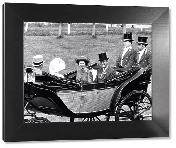 Queen Elizabeth II with Prince Philip driving up the course at Royal Ascot