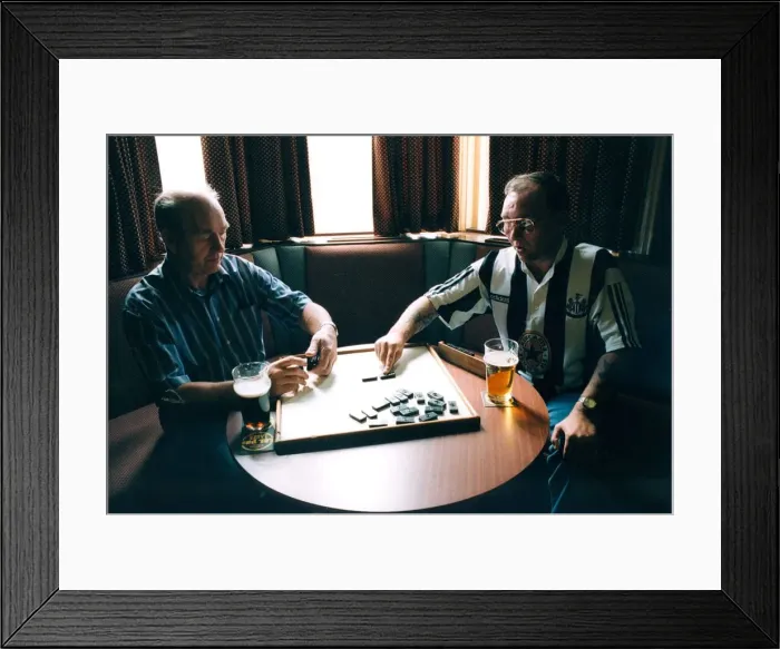 Framed Print : Stephen Harrison plays dominoes with his dad Sid at their local club Framed Print : Stephen Harrison plays dominoes with his dad Sid at their local club