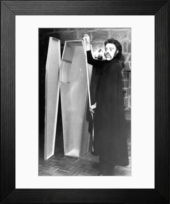 Framed Print : Danny Dee playing the part of Count Dracula measuring his coffin at Langley Castle Framed Print : Danny Dee playing the part of Count Dracula measuring his coffin at Langley Castle