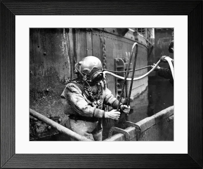 Framed Print : A diver in an old fashioned suit that you had to be bolted into Framed Print : A diver in an old fashioned suit that you had to be bolted into