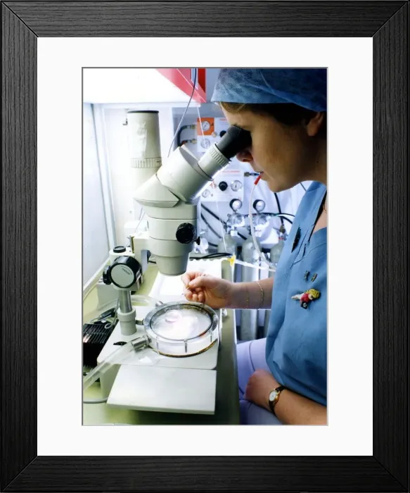 Framed Print : Senior embryologist Jane Skelton using state-of-the-art micro manipulation equipment