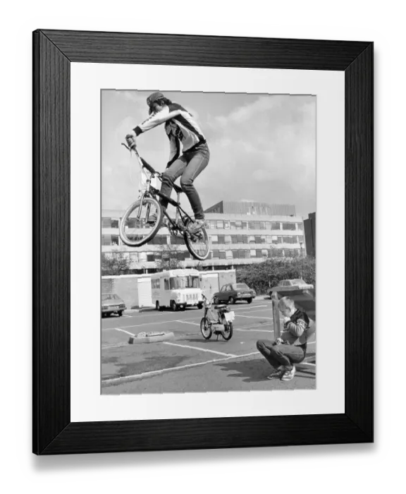 Framed Print : Stunt rider Andrew Bell of Team conway BMX team leaps over fellow club member Mark Taylor