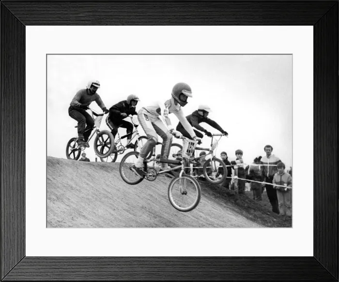 Framed Print : Young contestants over the obstacle in a BMX race at Windy Nook Framed Print : Young contestants over the obstacle in a BMX race at Windy Nook