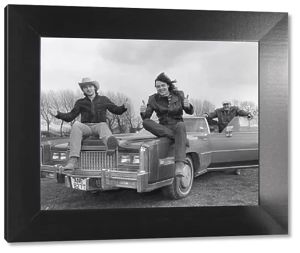 North rock band Battle-Axe, Singer Dave King (centre) shows off the Cadillac to