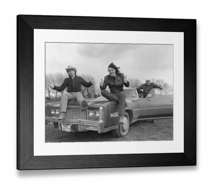 Framed Print : North rock band Battle-Axe, Singer Dave King (centre) shows off the Cadillac to