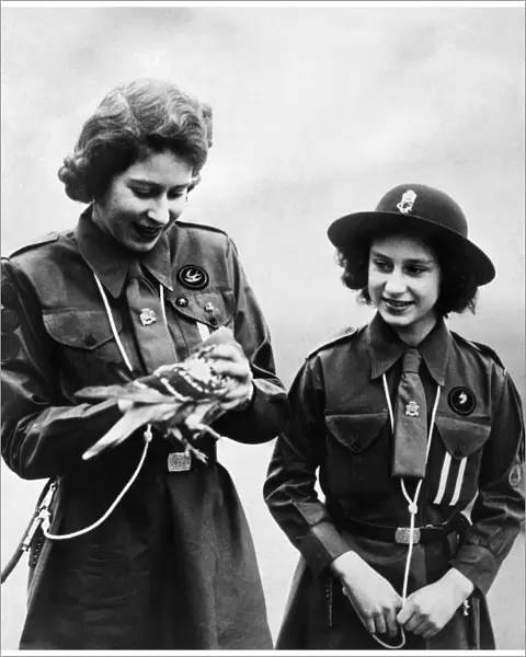 Queen Elizabeth II, Girl Guides Princess Elizabeth and Princess Margaret about to send a
