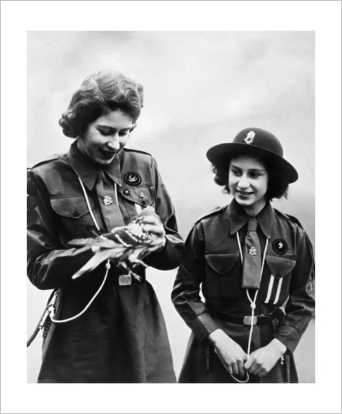 Queen Elizabeth II, Girl Guides Princess Elizabeth and Princess Margaret about to send a