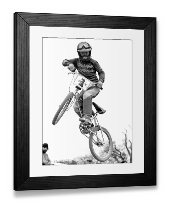 Framed Print : A boy doing stunts on his BMX cycle Framed Print : A boy doing stunts on his BMX cycle