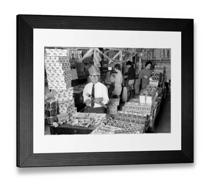 Framed Print : While most people today are trying to forget Christmas, workers at Napier Novelty Company