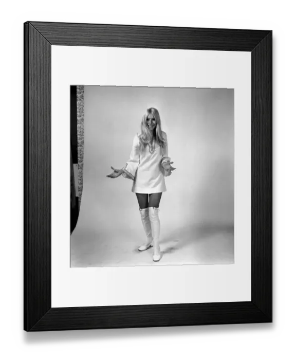 Framed Print : Eva Haraldsted, ex-girl friend of soccer star George Best in a white party dress trimmed