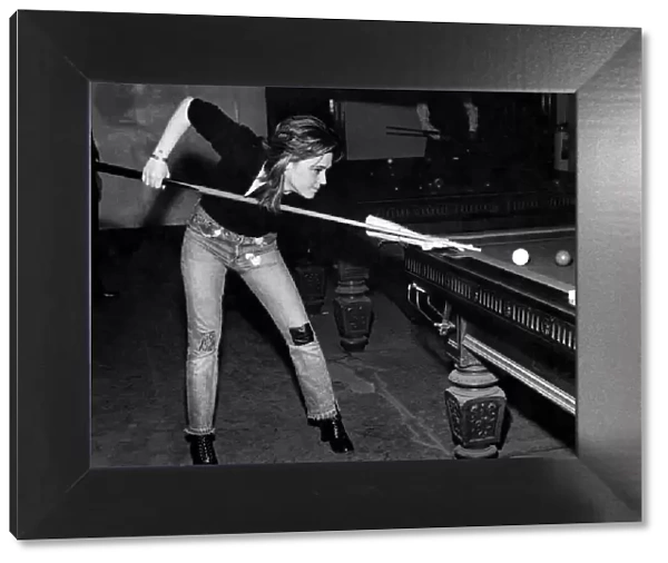 Boogie band leader and singer  /  guitarist Suzie Quatro, pictured playing snooker at