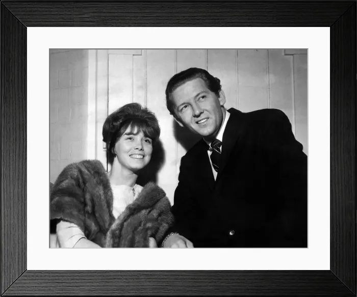 Framed Print : Jerry Lee Lewis listens to the show with his wife before he entertained the huge crowd Framed Print : Jerry Lee Lewis listens to the show with his wife before he entertained the huge crowd