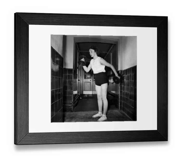 Framed Print : Metal boots to give her more speed. Schoolgirl with metal boots is schoolgirl champion Framed Print : Metal boots to give her more speed. Schoolgirl with metal boots is schoolgirl champion