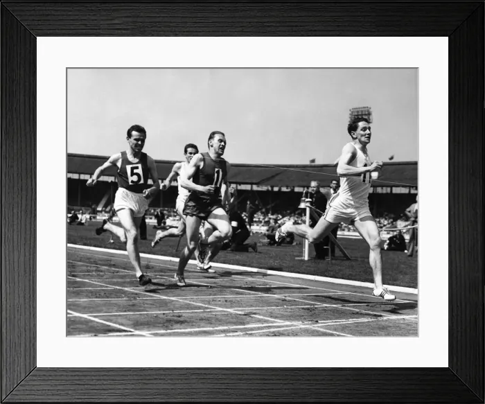 Framed Print : M. A. Rawson of Great Britain winning the 880 yds international, from K. H Framed Print : M. A. Rawson of Great Britain winning the 880 yds international, from K. H