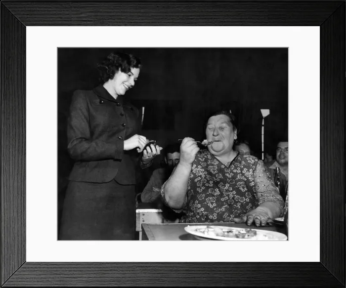 Framed Print : Woman eating dinner in the canteen at a labour factory. August 1952 P009089 Framed Print : Woman eating dinner in the canteen at a labour factory. August 1952 P009089