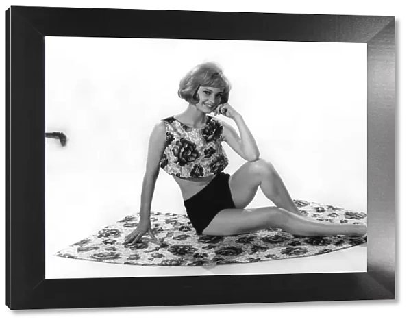 Model Dawn Adams wearing flowery paterned vest top. July 1962 P008947