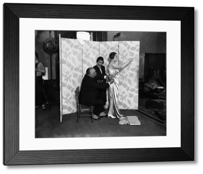 Framed Print : M. Paul Poiret designing a gown on one of his mannequins. December 1924 P008637 Framed Print : M. Paul Poiret designing a gown on one of his mannequins. December 1924 P008637