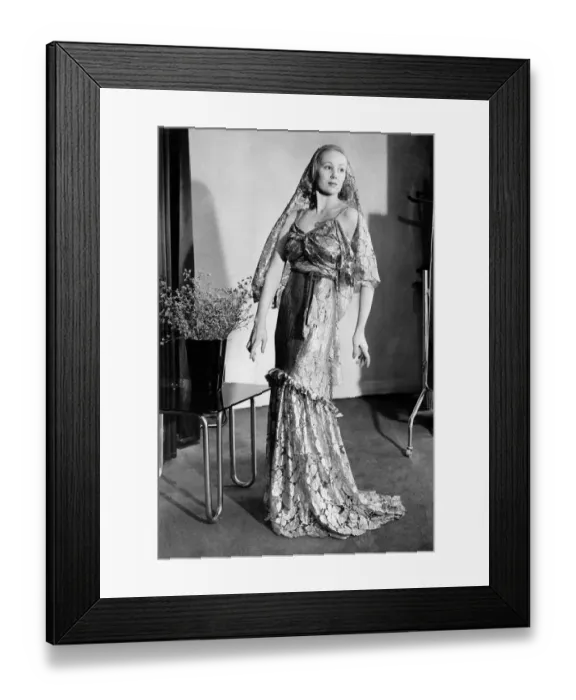 Framed Print : Clothing. Worth a million. Evening dress of gold lace with head dress of same material Framed Print : Clothing. Worth a million. Evening dress of gold lace with head dress of same material