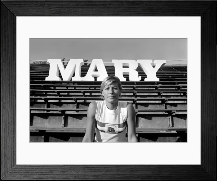 Framed Print : British runner Mary Rand poses during a photoshoot on the race track Framed Print : British runner Mary Rand poses during a photoshoot on the race track