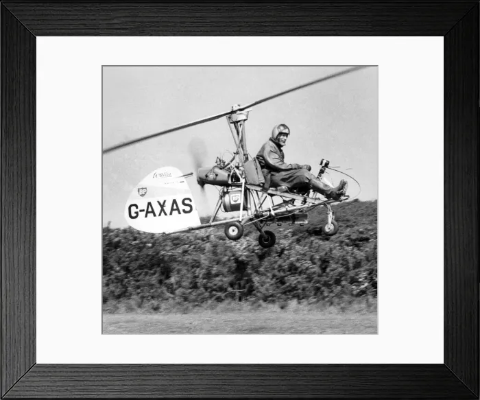 Framed Print : A tiny Autogyro, flown by its designer Wing Cmdr. Ken Wallis searched the areas of Framed Print : A tiny Autogyro, flown by its designer Wing Cmdr. Ken Wallis searched the areas of