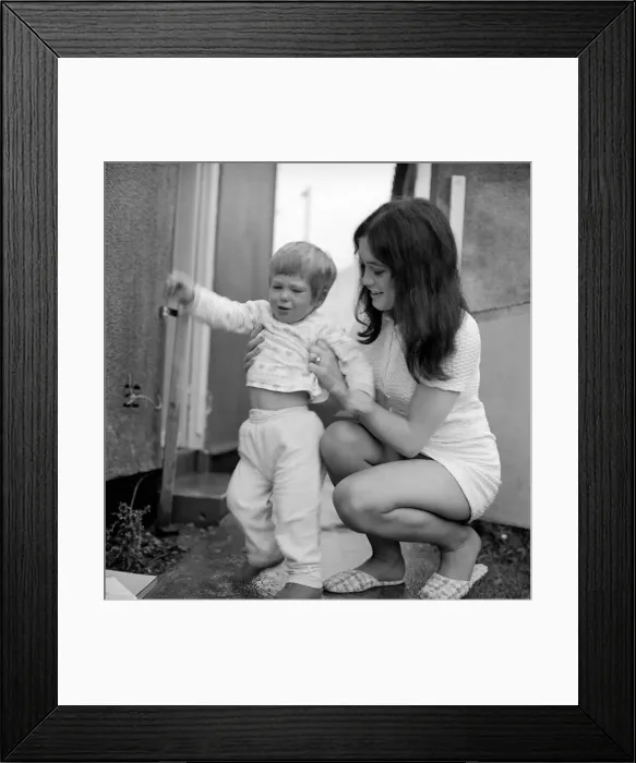 Framed Print : A mother with her two year old boy toddler. December 1969 Z11890