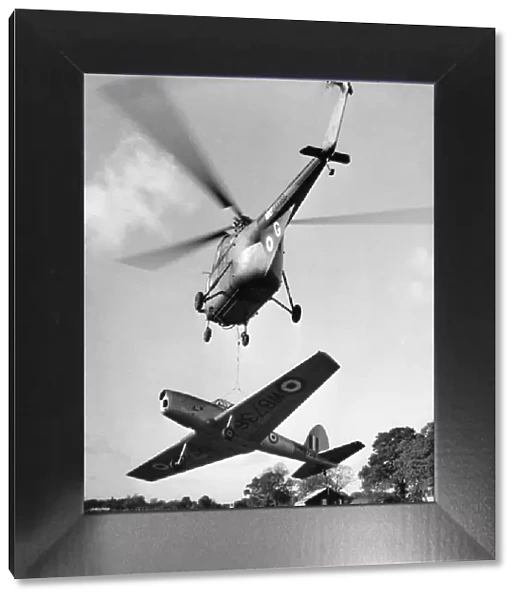 In his Whirlwind helicopter up went Flight Lt. Jimmy Stuart of the joint experimental