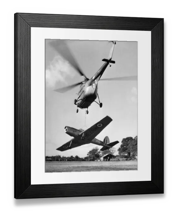 Framed Print : In his Whirlwind helicopter up went Flight Lt. Jimmy Stuart of the joint experimental