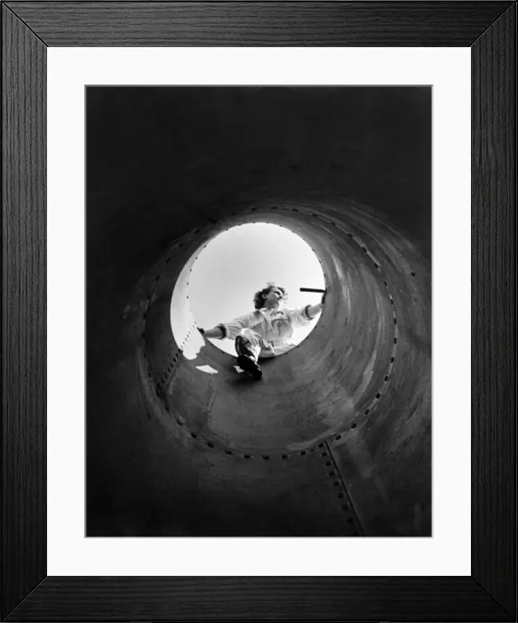 Framed Print : Mrs. Giselle Leopold of Henley on Thames who has taken a job as a Steeple Jack Framed Print : Mrs. Giselle Leopold of Henley on Thames who has taken a job as a Steeple Jack