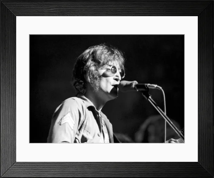 Framed Print : John Lennon and Yoko Ono in charity concert in New York. August 1972 72-8526-008