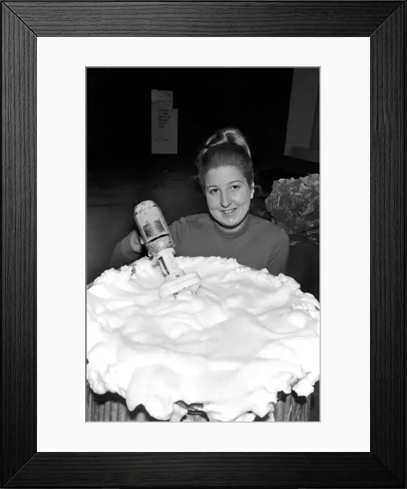 Framed Print : Woman hand mixes the solution to make cream pies to be thrown Framed Print : Woman hand mixes the solution to make cream pies to be thrown