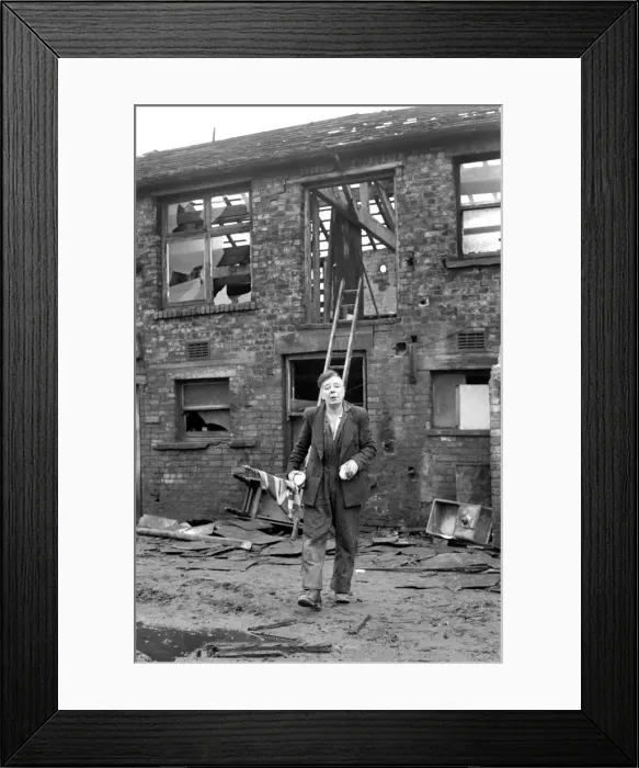 Framed Print : Cyril Eachus seen here leaving his old works building after being evicted by baliliffs Framed Print : Cyril Eachus seen here leaving his old works building after being evicted by baliliffs
